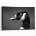 Framed canvas wall art featuring a stylish goose design in a modern black frame, showcasing vibrant colors and intricate details, perfect for home decor.