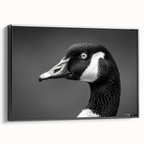 Framed canvas wall art featuring a stylish goose design in a modern black frame, showcasing vibrant colors and intricate details, perfect for home decor.