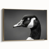 Framed wall art featuring a serene gold-accented goose design on canvas, showcasing elegant details and textures in a modern setting, perfect for home decor.