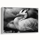Framed wall art featuring a serene goose design on a white canvas, showcasing elegant brush strokes and a modern aesthetic, perfect for home decor.