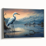 Elegant framed wall art featuring a heron and egret design, showcasing silver accents and a textured canvas surface, perfect for enhancing home decor.