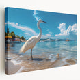 Stretched canvas wall art showcasing a serene heron and egret design against a soft blue background, perfect for nature lovers’ home decor.