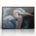 Framed wall art featuring a heron and egret design, showcasing vibrant colors against a black background, perfect for enhancing home decor with a nature theme.