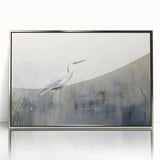 Framed wall art showcasing a serene heron and egret design in elegant silver accents, perfect for enhancing modern home decor.