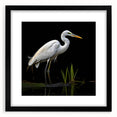 Elegant black-framed wall art featuring a serene heron and egret design, showcasing delicate brush strokes on a textured background, perfect for nature-inspired decor.