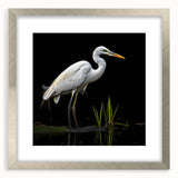 Framed wall art featuring elegant herons and egrets in a serene design, set in a silver frame with a mat, perfect for enhancing home decor.