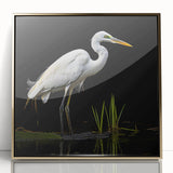 Framed wall art featuring a graceful heron and egret design, showcasing intricate details and vibrant colors, set in a gold frame, perfect for enhancing home decor.