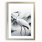 Framed wall art featuring a heron and egret design, showcasing intricate details and a silver frame with matting, perfect for enhancing home decor.