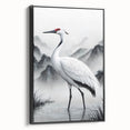 Framed canvas wall art showcasing a heron and egret design in a black frame, highlighting elegant bird silhouettes against a muted background, perfect for home décor.