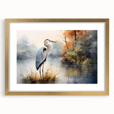 Elegant framed wall art showcasing a heron and egret design in a gold frame, featuring a mat for added sophistication, ideal for home decor.