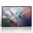 Framed wall art showcasing a vibrant hummingbird design on acrylic with a sleek black frame, perfect for adding a touch of nature-inspired decor to any room.
