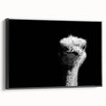 Framed wall art featuring a detailed ostrich design on a black background, showcasing vibrant colors and intricate patterns, ideal for modern home decor.