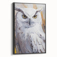 Framed canvas wall art featuring a striking owl design in vibrant colors, showcasing intricate details on a black background, ideal for modern home decor.