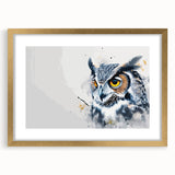 Elegant gold-framed wall art featuring an owl design, showcasing intricate details and vibrant colors, perfect for enhancing home decor in living spaces or offices.