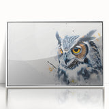 Framed wall art featuring an intricately designed owl in vivid colors, set in a sleek white frame, perfect for enhancing home decor with nature-inspired elegance. Ideal for bird lovers and art enthusiasts seeking unique, eye-catching pieces.