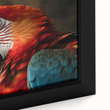 Close-up of a framed canvas wall art featuring vibrant parrots in a tropical design, showcasing detailed feathers and bright colors, perfect for home decor.