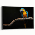 Framed canvas wall art showcasing a vibrant design of colorful parrots perched among tropical foliage, set against a sleek black frame, perfect for enhancing home decor.