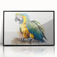 Framed wall art featuring a vibrant design of colorful parrots, displayed in a sleek black frame, perfect for enhancing home decor with a tropical touch.