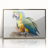 Framed wall art featuring a vibrant parrot design in acrylic with a gold border, showcasing tropical colors and intricate details, ideal for enhancing decor.