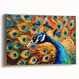 Framed wall art featuring a vibrant peacock design in gold and blue tones, showcasing intricate feather details against a white background, perfect for elegant decor.