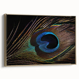 Framed wall art showcasing a vibrant peacock design on canvas, featuring rich gold accents and a sleek modern frame, perfect for enhancing home decor.