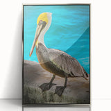 Framed wall art featuring a silver-accented pelican design, showcasing intricate details and vibrant colors, perfect for coastal-themed home decor.