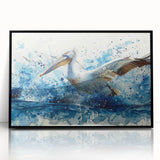 Framed wall art featuring a vibrant pelican design on an acrylic surface, set in a sleek black frame, perfect for coastal-themed decor.