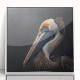 Framed wall art featuring a striking pelican design, showcasing vibrant colors on acrylic, set against a sleek white frame, ideal for coastal decor.