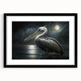 Elegant black-framed wall art featuring a vibrant pelican design, perfect for coastal decor. Ideal for enhancing living spaces with a touch of nature.