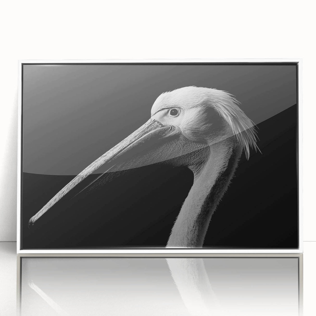Framed acrylic wall art featuring a stylized pelican design on a white background, ideal for coastal-themed decor, enhancing living spaces with a touch of nature.