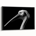 Framed canvas wall art featuring a side view of a stylized pelican design in black, perfect for enhancing modern home decor with a touch of elegance.