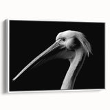 Framed canvas wall art featuring a side view of a pelican design, showcasing vibrant colors and intricate detailing, perfect for coastal-themed decor.
