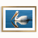 Elegant wall art featuring a pelican design, framed in gold with a mat, showcasing intricate details and a modern aesthetic, perfect for enhancing home decor.