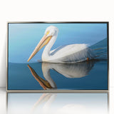 Framed wall art featuring a silver-accented pelican design, showcasing vibrant colors and intricate details, perfect for enhancing coastal-themed decor.