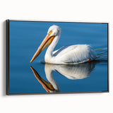 Framed wall art featuring a stylish pelican design on a textured canvas, presented in a sleek black frame, ideal for modern home decor or coastal-themed interiors.