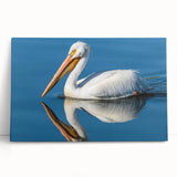 Stretched canvas wall art featuring a vibrant pelican design, showcasing rich colors and intricate details, perfect for enhancing coastal-themed decor.