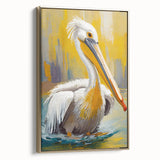 Framed canvas wall art depicting a side view of a striking pelican design in gold and white, perfect for coastal home decor or bird enthusiasts.