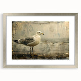 Framed wall art featuring a collection of sea birds in detailed illustrations, set in a silver frame with a mat, perfect for coastal-themed home decor.