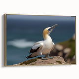 Framed canvas artwork showcasing a vibrant sea birds design in gold tones, perfect for coastal-themed decor, displayed from a side view to highlight its elegant frame.