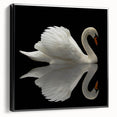 Framed canvas wall art showcasing an elegant swan design in black and white, ideal for modern decor. The piece adds a sophisticated touch to any living space or office.