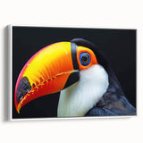 Framed wall art featuring a vibrant tropical bird design on canvas, showcasing vivid colors and intricate details, ideal for adding a lively touch to home decor.
