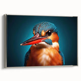 Framed canvas wall art featuring a vibrant tropical bird design with lush green foliage, elegantly presented in a silver frame, enhancing any modern decor.
