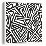 Framed black and white abstract wall art design showcasing dynamic shapes and lines, enhancing modern decor with a stylish side view.