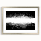 Framed black and white abstract wall art featuring geometric shapes and lines, set in a sleek silver frame with a white mat.