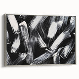 Framed black and white abstract wall art with a silver frame, showcasing dynamic geometric patterns and elegant design for modern decor.