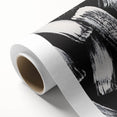 Black and white abstract design on rolled canvas art, featuring bold geometric shapes and fluid patterns, perfect for modern home decor.
