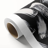 Black and white abstract design on rolled canvas art, featuring bold geometric shapes and fluid patterns, perfect for modern home decor.