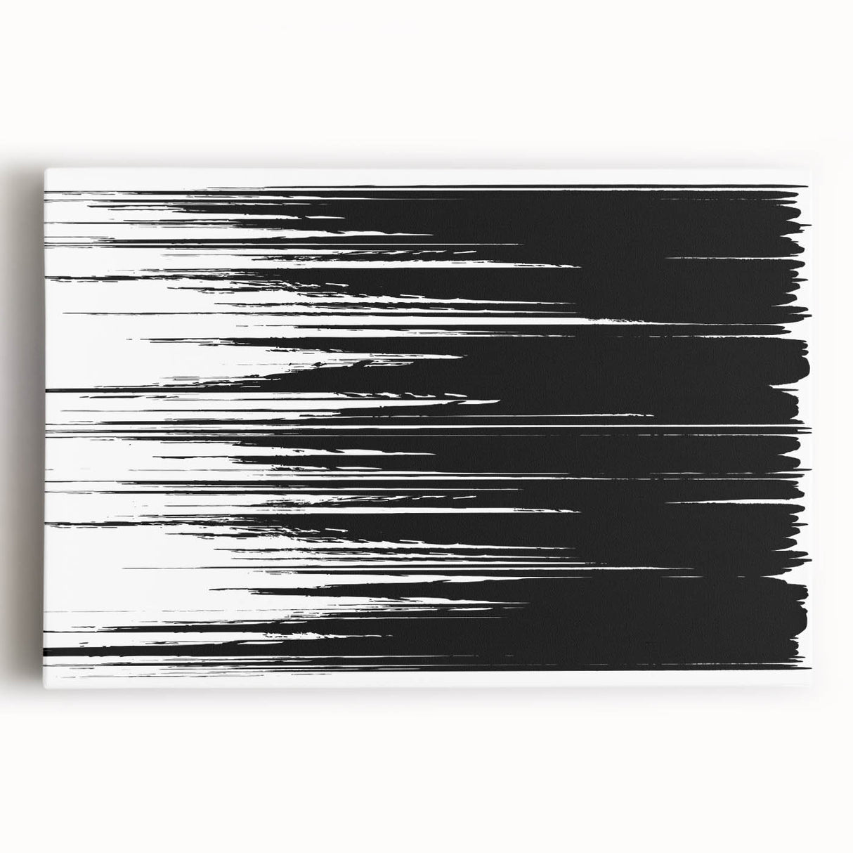 Abstract black and white wall art collection on stretched canvas, showcasing a modern design with dynamic shapes and textures, ideal for contemporary decor.