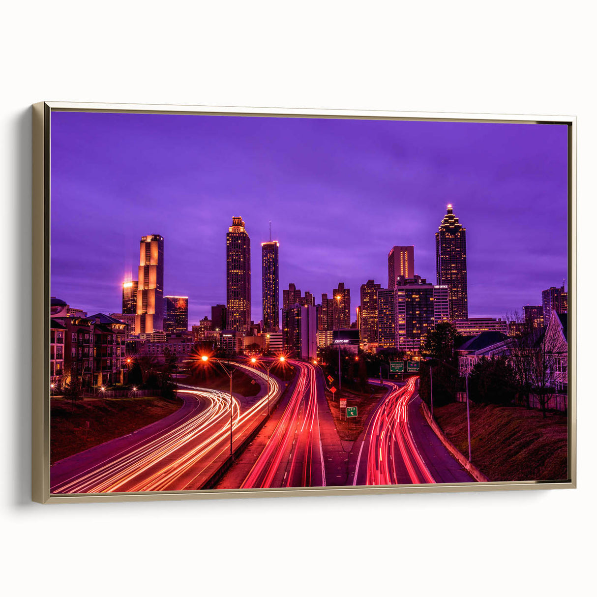 Framed canvas featuring a vintage-style Atlanta skyline in black with colorful highlights.