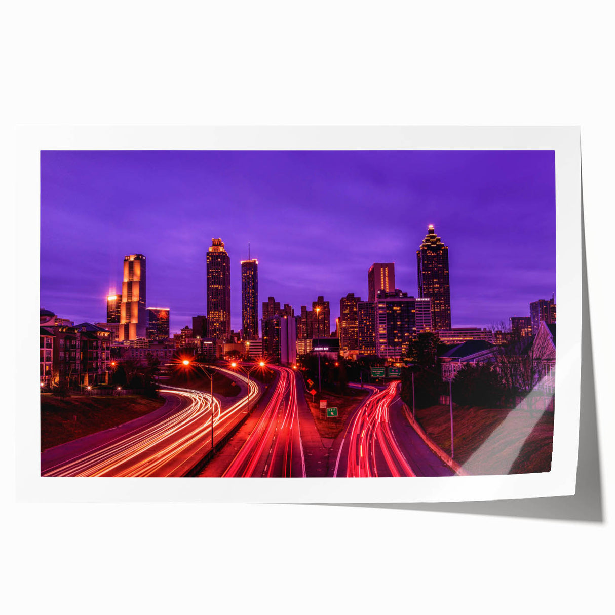 Atlanta skyline in muted gray and blue tones on a rolled canvas print, suitable for dining room decor.